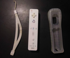 Nintendo Wii Remote with Rubber Grip and Nyko Charging Dock